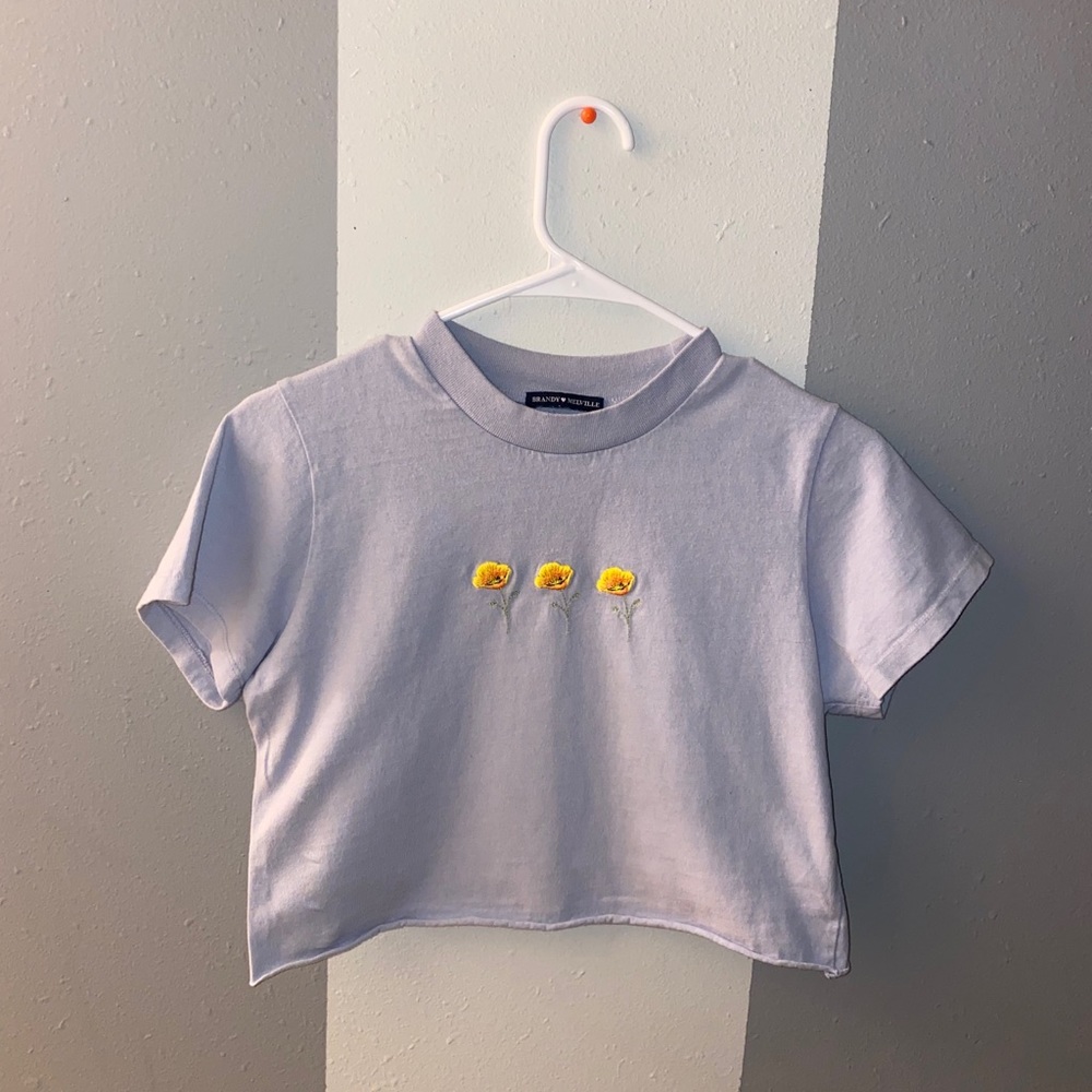 Brandy Melville t-shirt with flowers on th…
